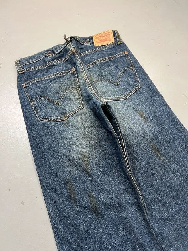 Vintage Levi’s Buckle Belt Denim Jeans | Size 36 | Blue Avant-Garde Pants — image 11 of 15