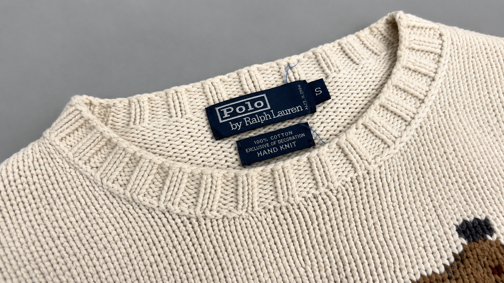 Ralph Lauren Polo sweater label showing brand and fabric information