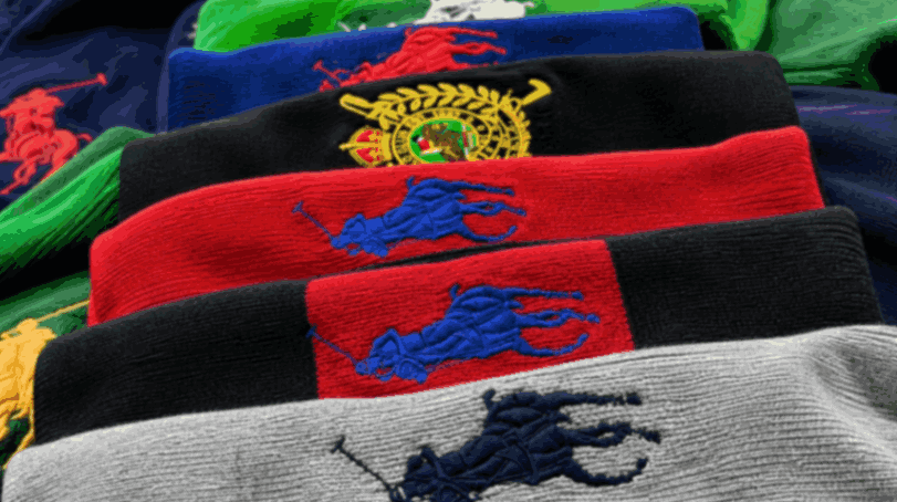 Close-up of Ralph Lauren Polo Pony embroidery on colorful knitwear